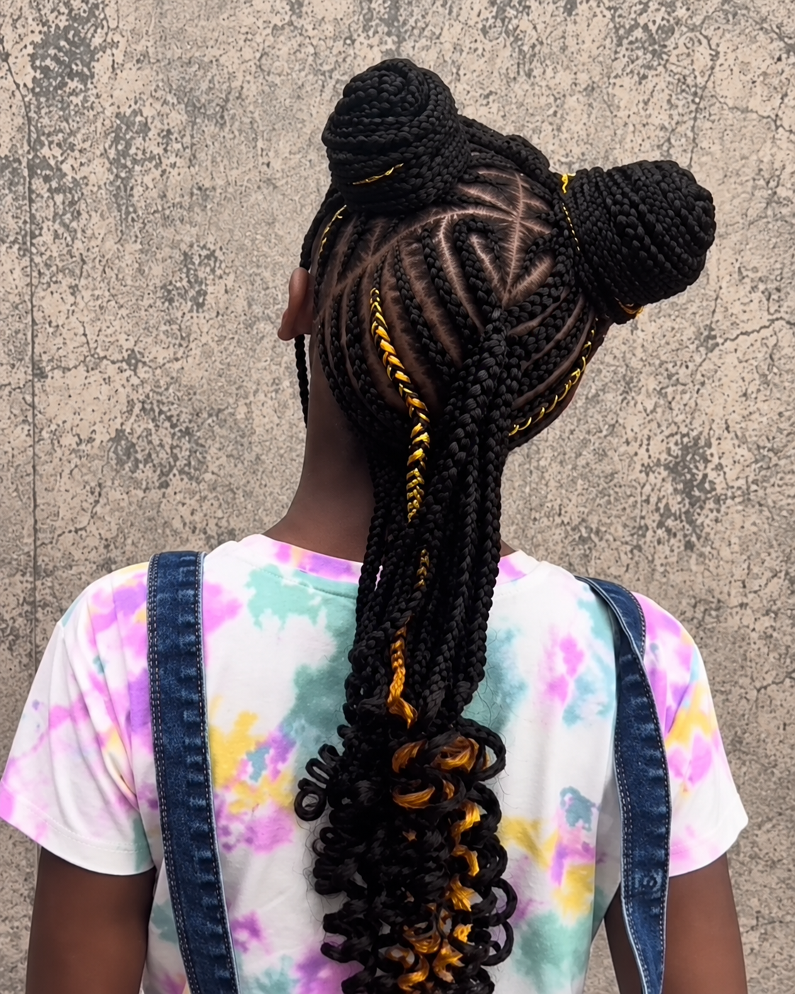 Kids braided double buns — back view