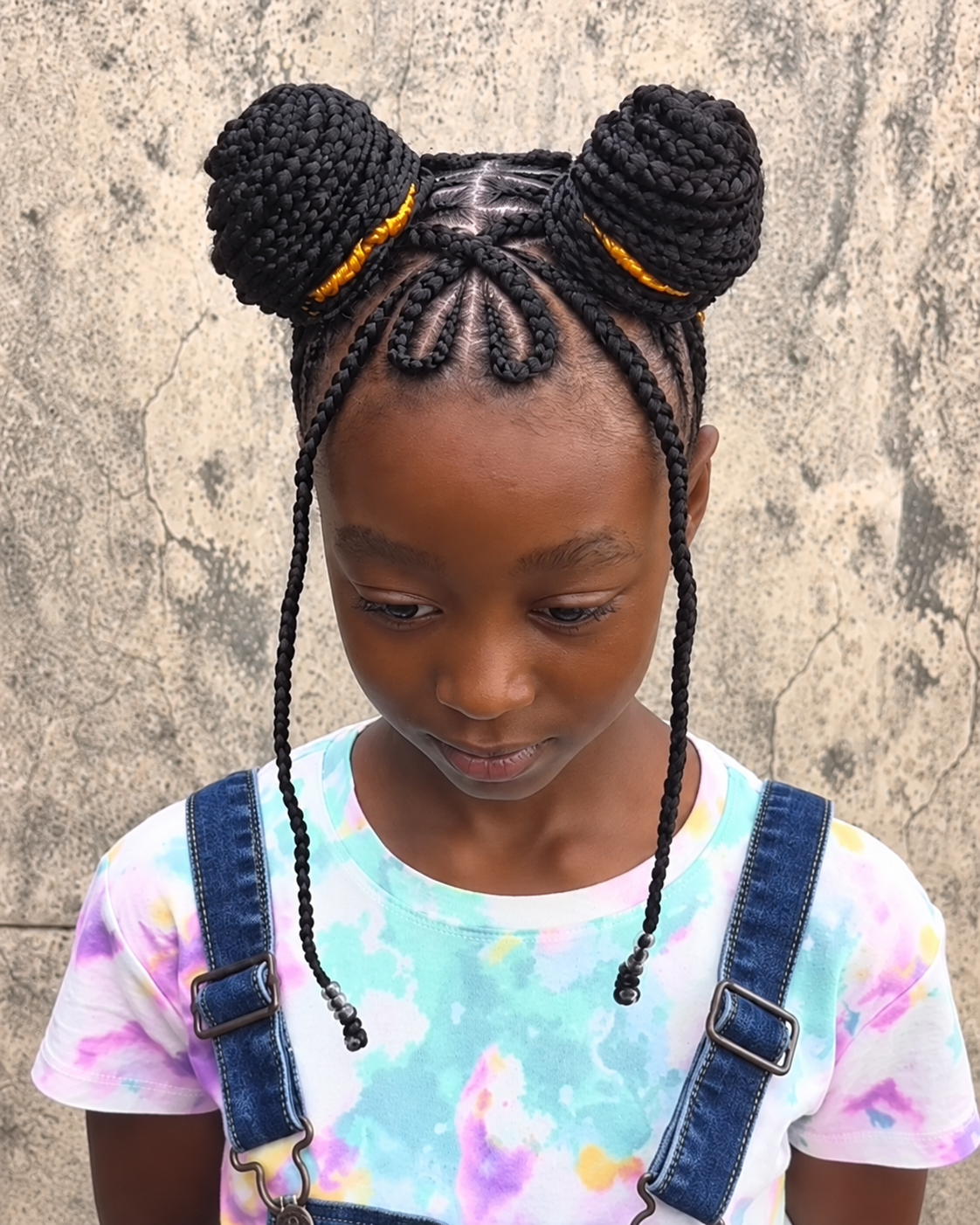Kids braided double buns — front view at AD Blades and Braids