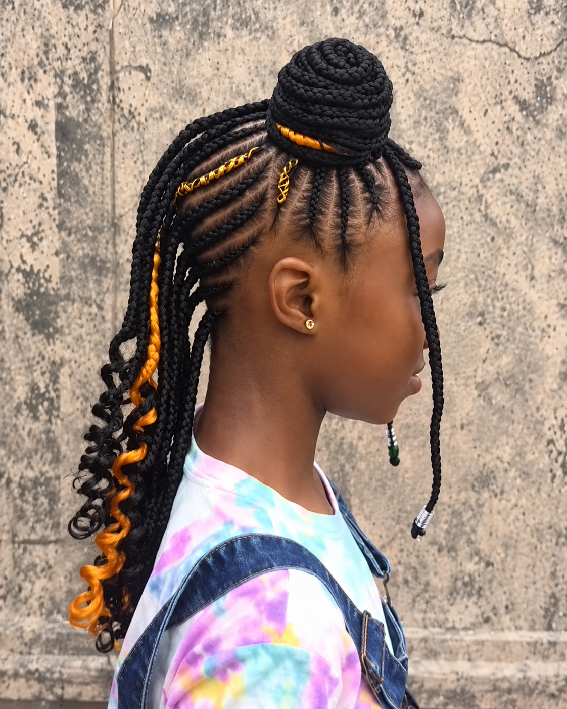 Kids braided double buns — side view